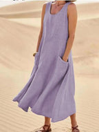 Cotton women's dress featuring a relaxed fit, stylish pockets, and a comfortable design, perfect for casual outings or everyday wear. 9