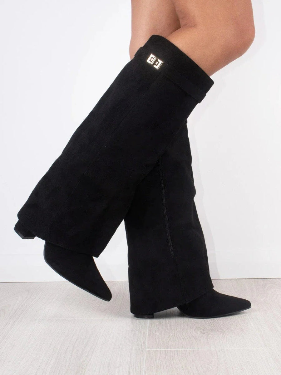 Knee high boots with a stylish flared top and comfortable block heel, perfect for fashionable fall and winter outfits. 3