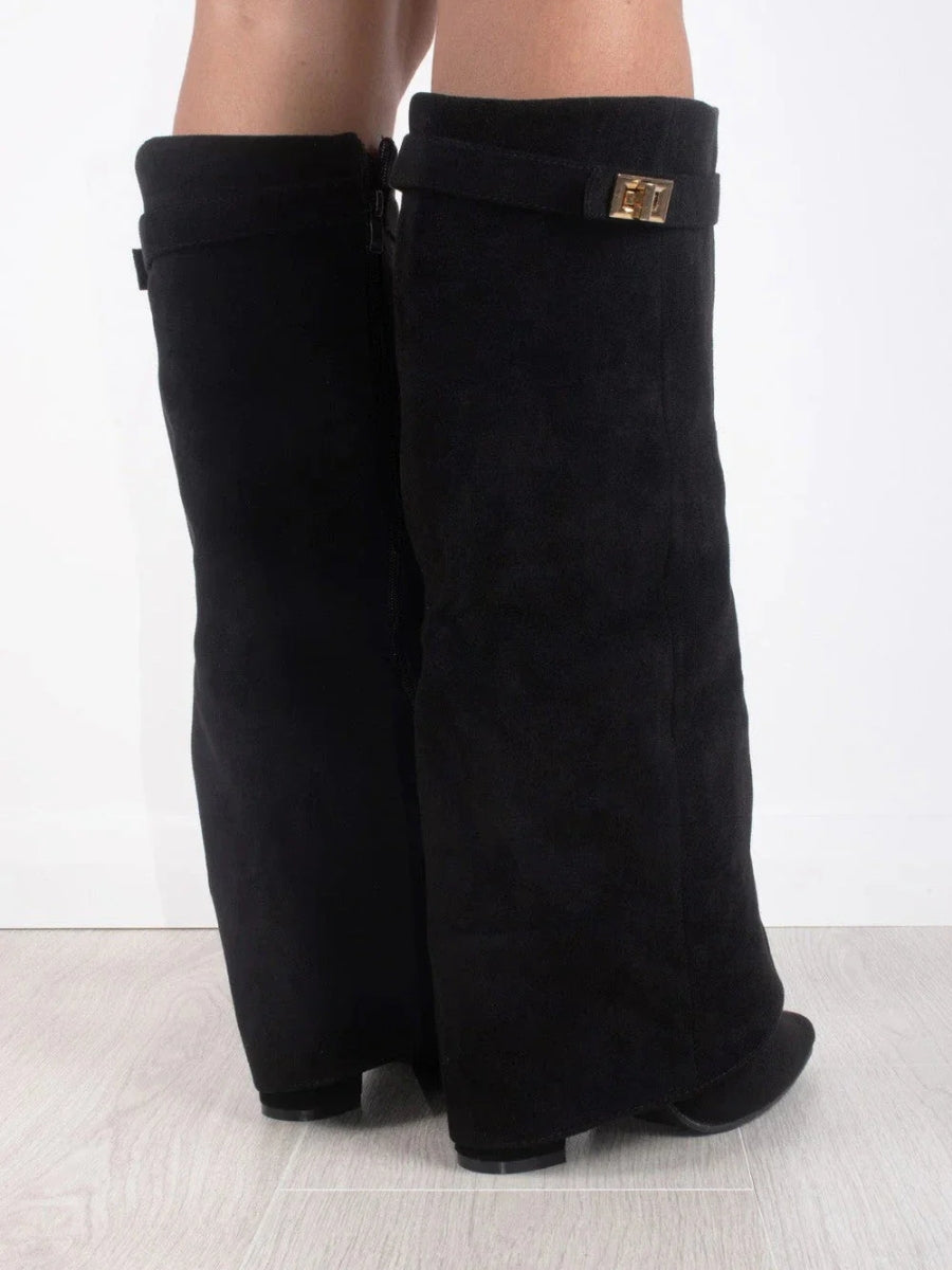 Knee high boots with a stylish flared top and comfortable block heel, perfect for fashionable fall and winter outfits. 5