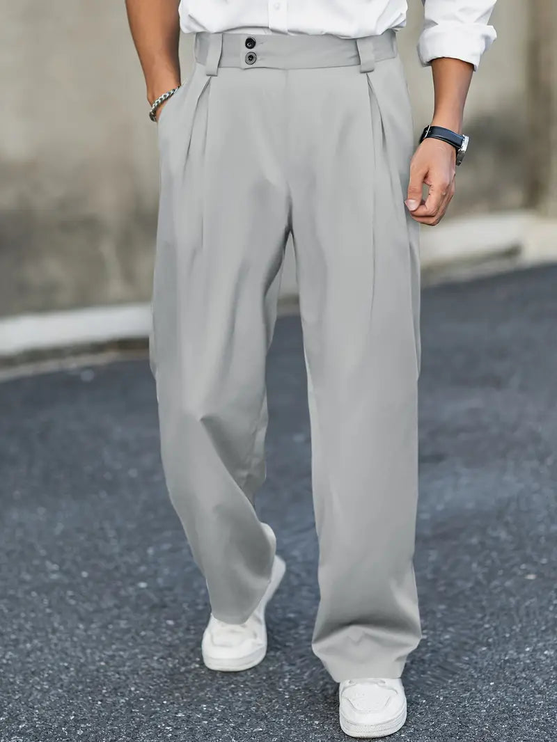 Loose-fitting wide leg trousers featuring stylish pleats and a double waistband, perfect for a comfortable yet fashionable look. 2