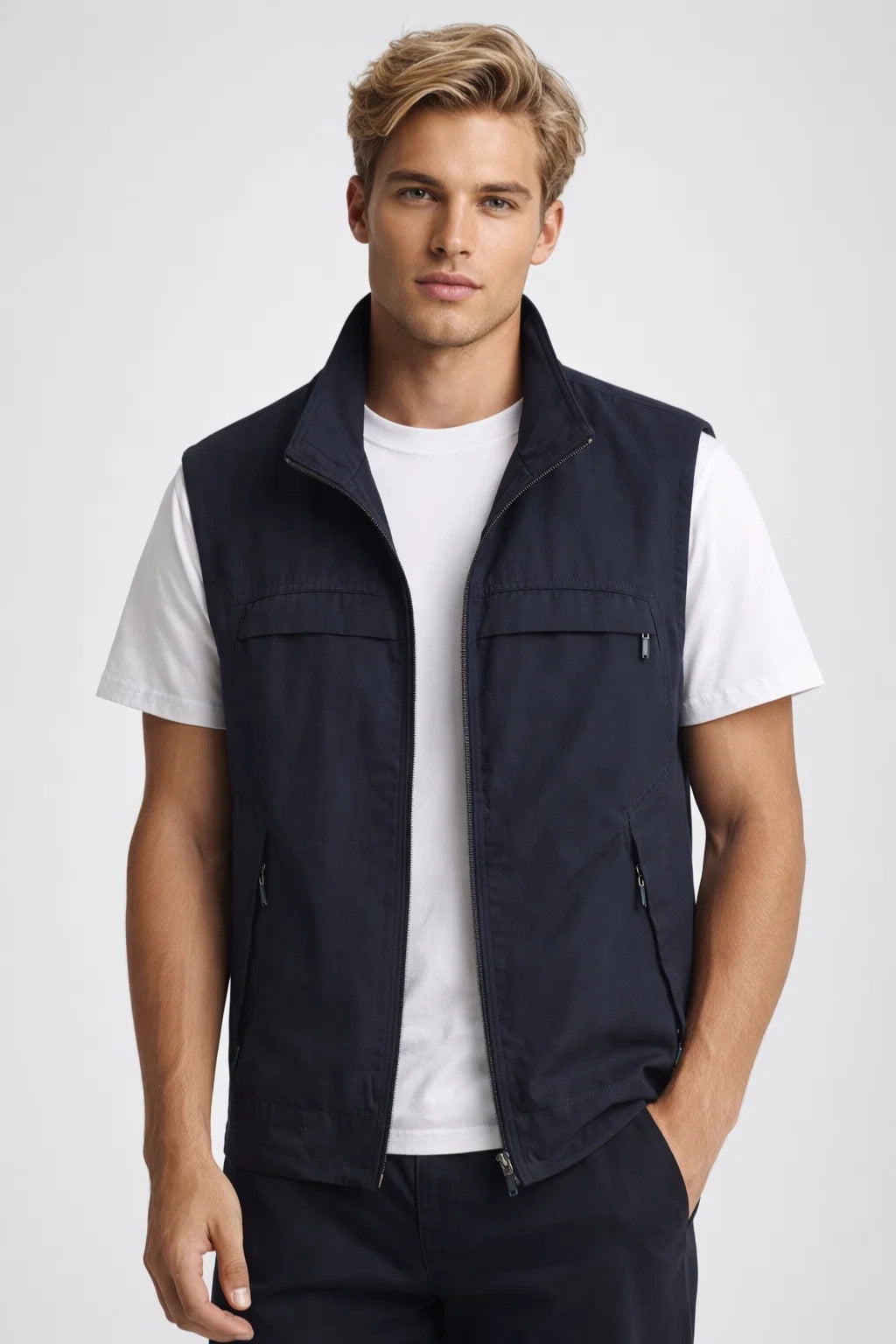 Men's lightweight vest featuring zippered pockets and a structured collar, ideal for outdoor activities and casual wear. 3