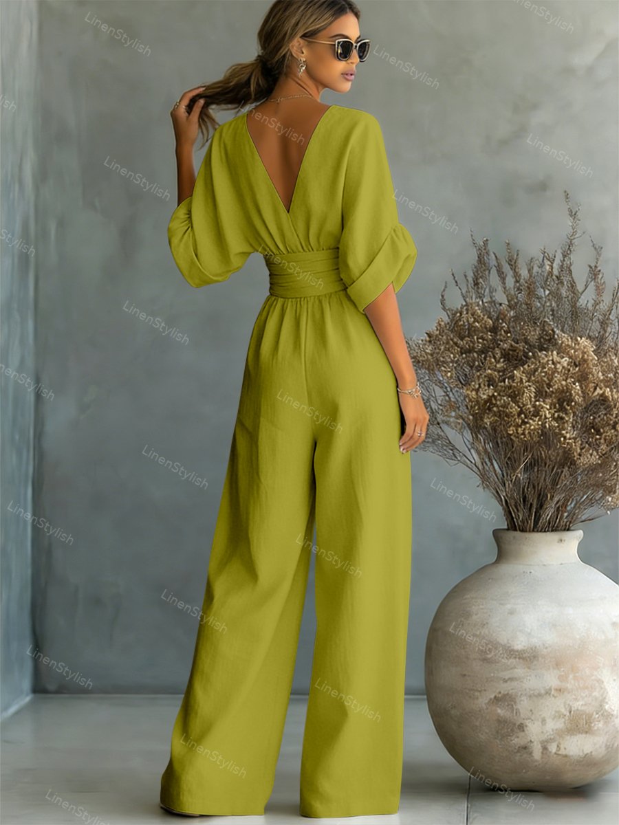V-Neck jumpsuit for women featuring a tailored fit and luxurious silk-touch fabric, perfect for elegant occasions and stylish outings. 7