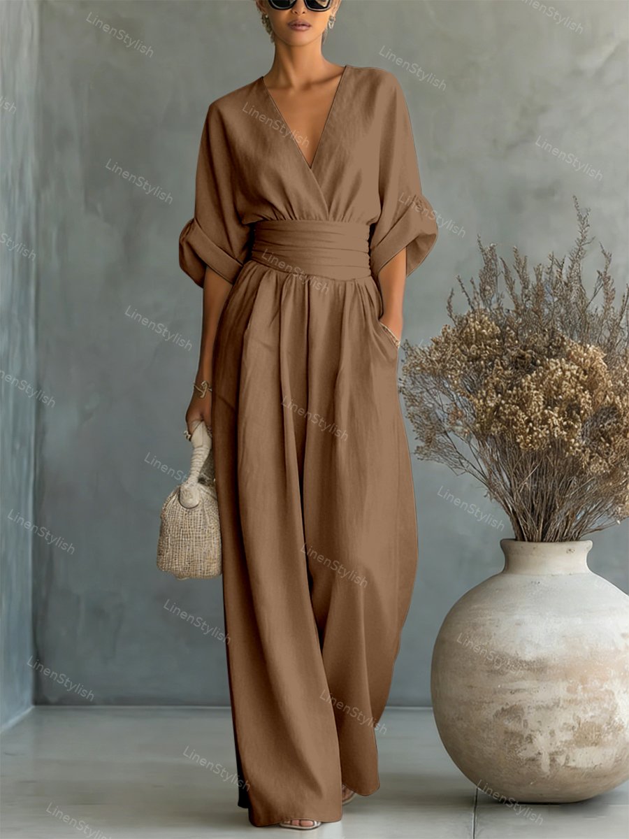 V-Neck jumpsuit for women featuring a tailored fit and luxurious silk-touch fabric, perfect for elegant occasions and stylish outings. 9