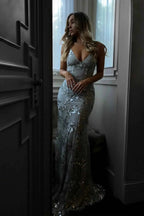 Elegant women's figure-hugging evening gown designed for gala events, featuring a flattering silhouette, intricate detailing, and a sophisticated color palette. 7