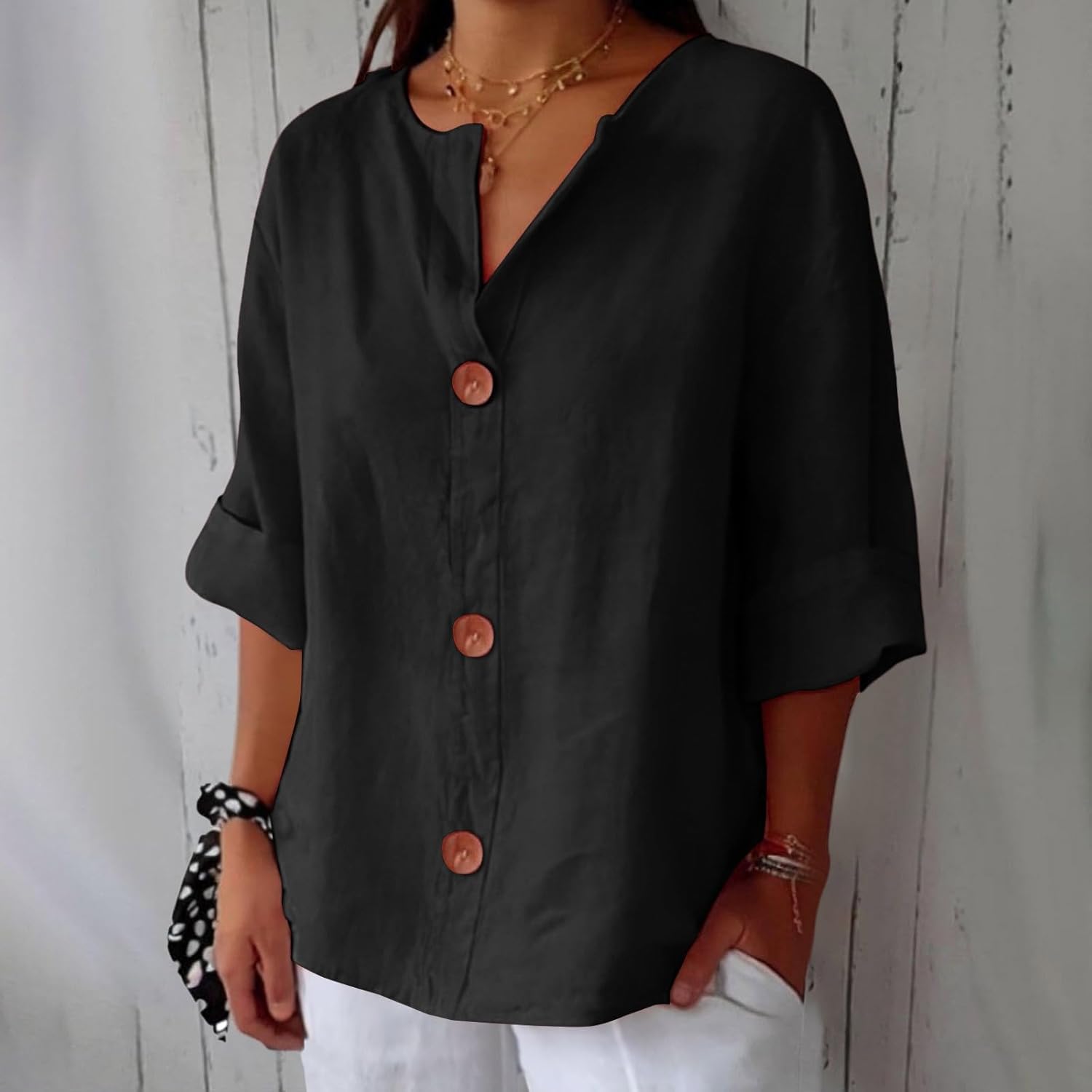 Women's loose fit blouse in lightweight summer linen, perfect for casual outings, featuring a relaxed silhouette and breathable fabric for comfort. 11