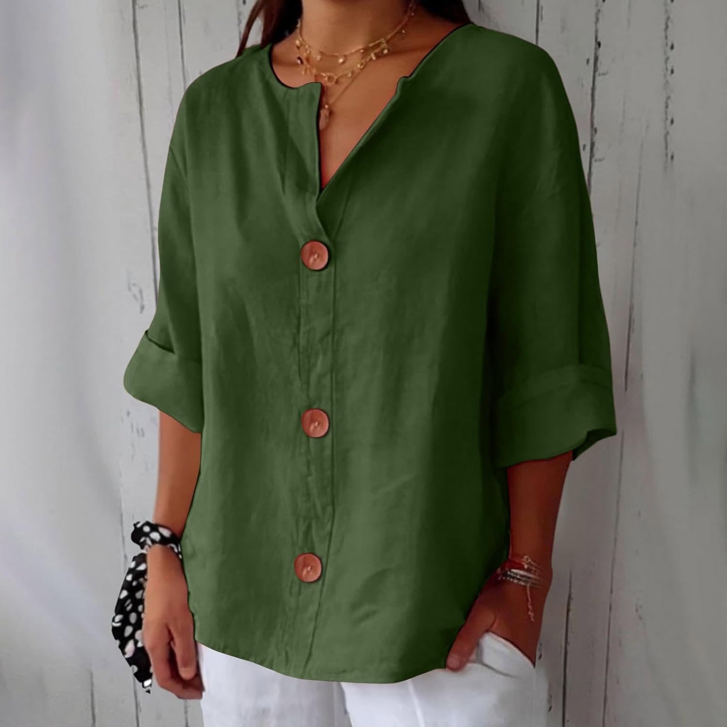 Women's loose fit blouse in lightweight summer linen, perfect for casual outings, featuring a relaxed silhouette and breathable fabric for comfort. 12