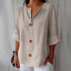 Women's loose fit blouse in lightweight summer linen, perfect for casual outings, featuring a relaxed silhouette and breathable fabric for comfort. 2