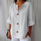 Women's loose fit blouse in lightweight summer linen, perfect for casual outings, featuring a relaxed silhouette and breathable fabric for comfort. 9