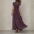 Elegant women's maxi dress featuring delicate lace trim, perfect for formal occasions and special events. 1