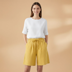 Women's relaxed fit knee-length shorts in a stylish design, perfect for casual outings and summer wear. 2