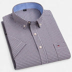 Women's short sleeve oxford shirt in a light and breathable fabric, perfect for casual summer outings, featuring a classic collar and a relaxed fit for comfortable wear 10