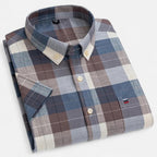 Women's short sleeve oxford shirt in a light and breathable fabric, perfect for casual summer outings, featuring a classic collar and a relaxed fit for comfortable wear 13