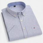 Women's short sleeve oxford shirt in a light and breathable fabric, perfect for casual summer outings, featuring a classic collar and a relaxed fit for comfortable wear 9