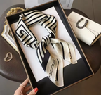 Women's silk square scarf in elegant patterns, perfect fashion accessory for all occasions, adding a touch of sophistication and style. 0