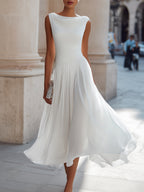 Women's sleeveless pleated midi dress in plus size, perfect for formal cocktails, featuring a flattering silhouette and elegant design. 0