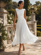 Women's sleeveless pleated midi dress in plus size, perfect for formal cocktails, featuring a flattering silhouette and elegant design. 3